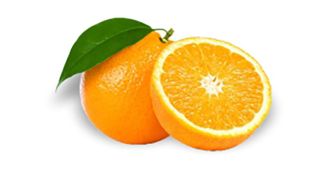 Whole and halved orange with leaf on white background.