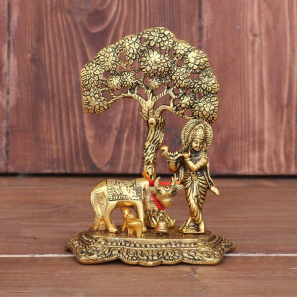 KridayKraft Prince Home Decor & Gifts Metal Krishna With Cow Standing Under Tree Plying Flute (Gold, 12.5X8X16Cm), 1 Piece